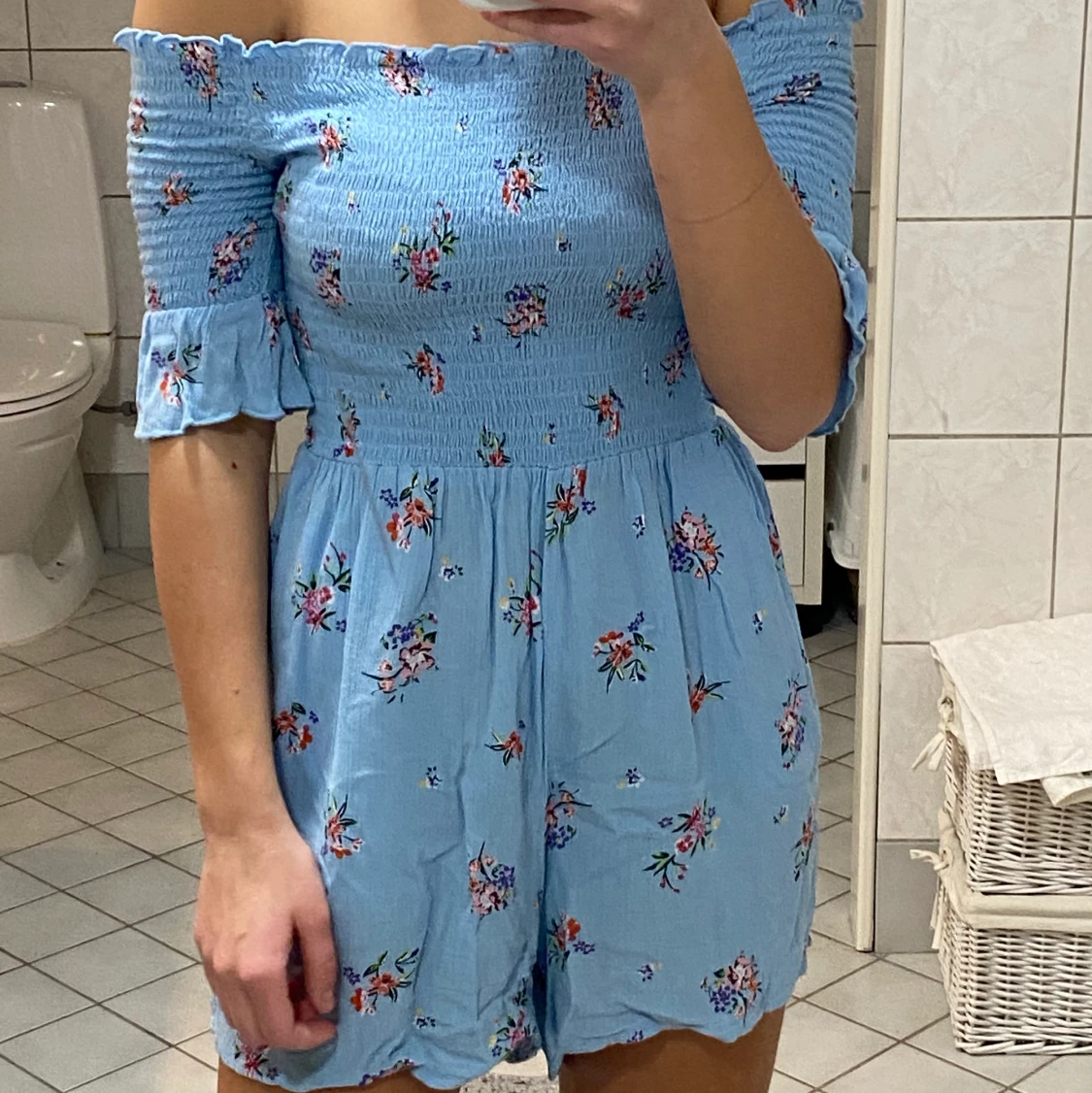 Blommig blå playsuit - 90