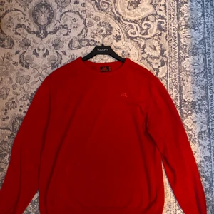Kappa tröja  - Stickad Röd Kappa tröja i storlek L passar M