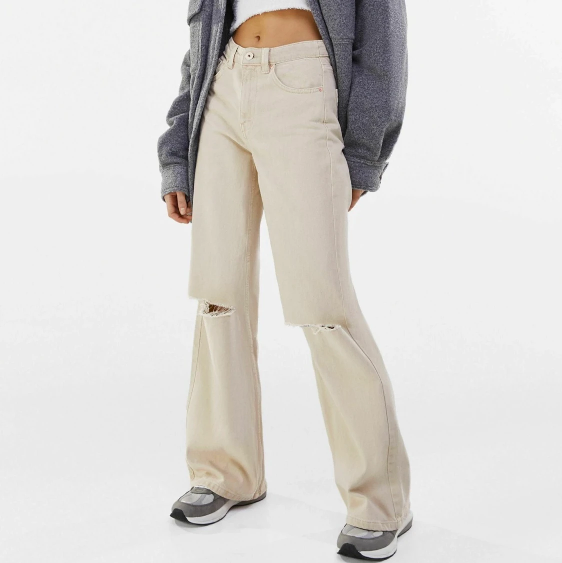 Oanvända jättefina beige flared jeans