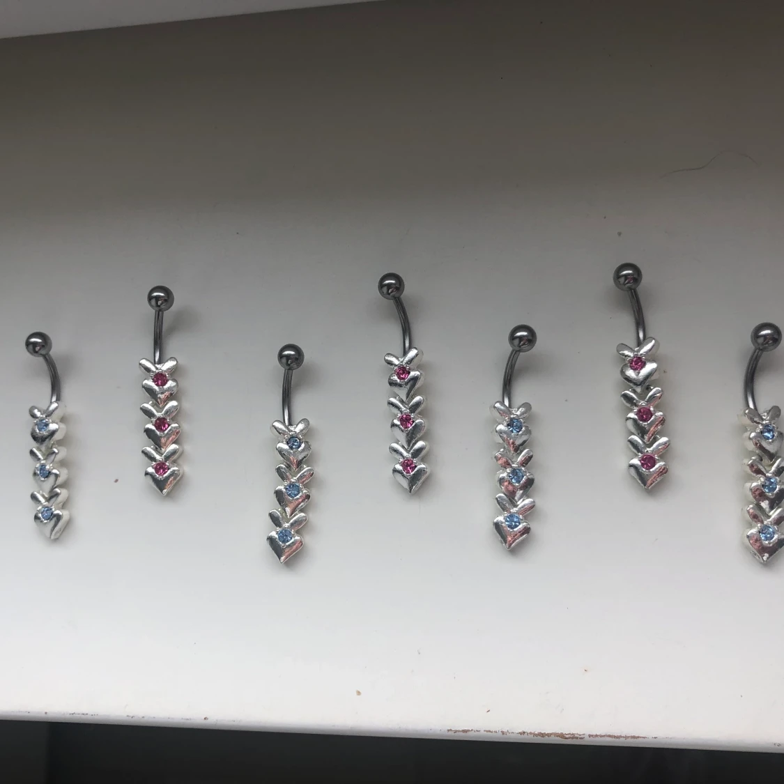 REA navelpiercing  - 91