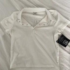 Topp - Lappen är kvar på, oanvänd, bra skick 