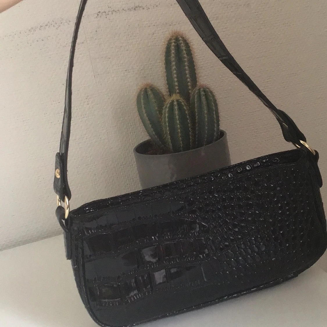 Svart vĂ€ska đ€