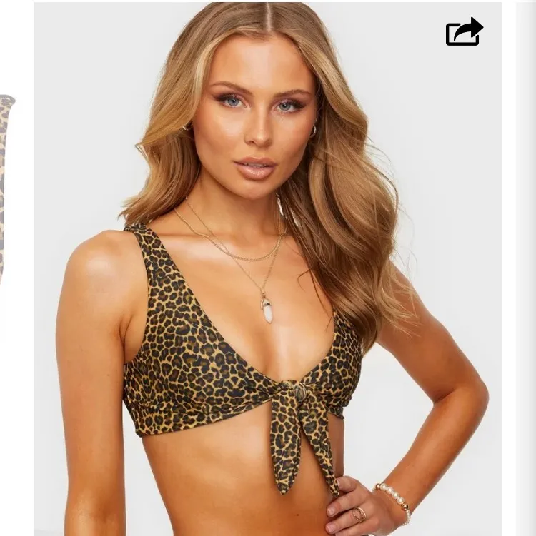 Leopard mönstrad bikinitopp från Nelly använd 1 gång förra sommaren. I storlek XS.. Accessoarer.