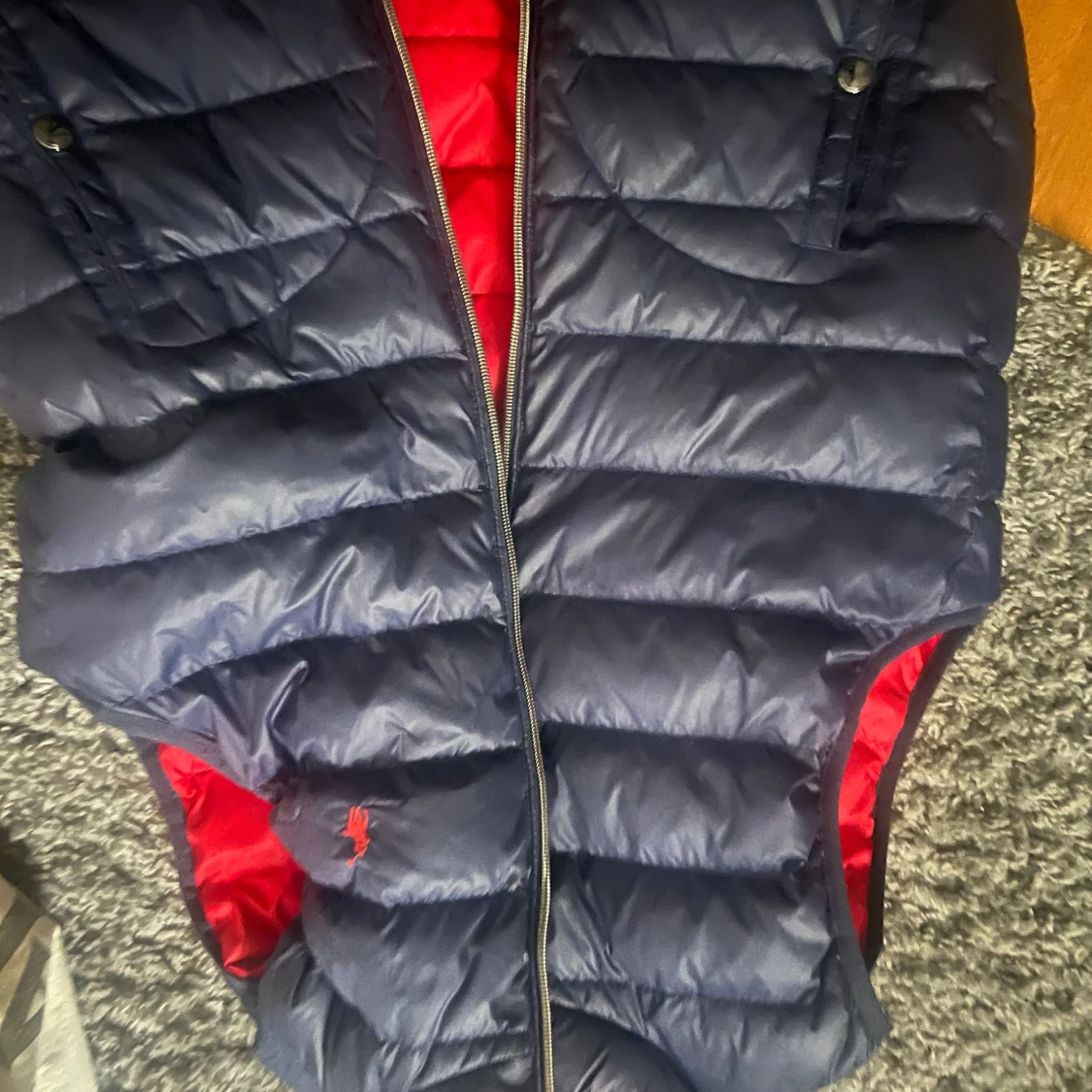 Vändbar dunväst från U.S. Polo Assn.