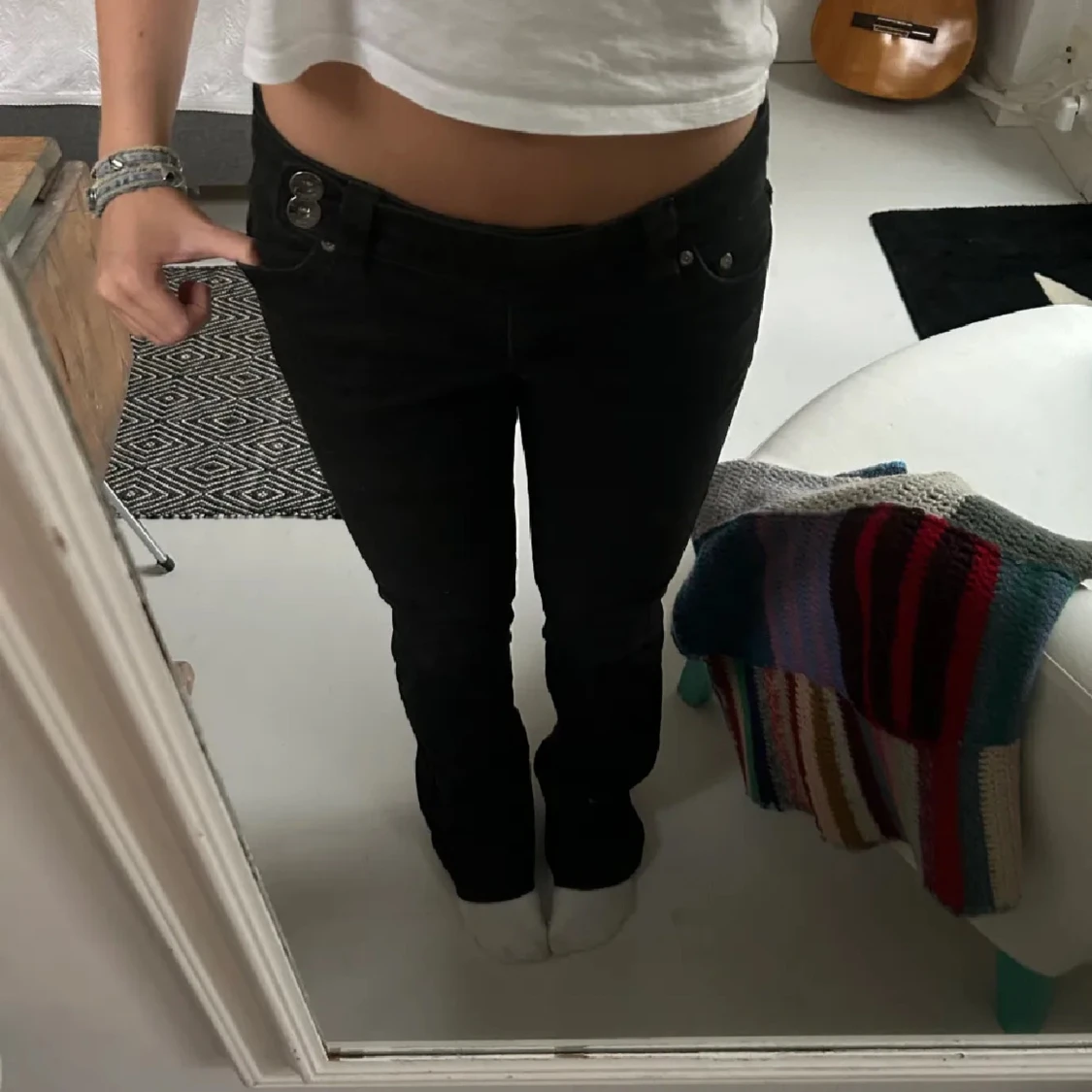 Svarta bootcut jeans med låg midja