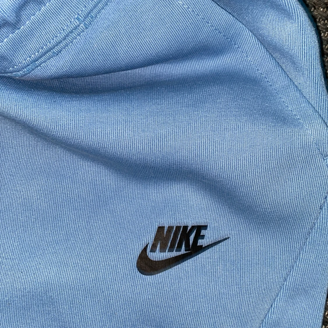 Nike ljusblå mjukisbyxor med snörning - 3