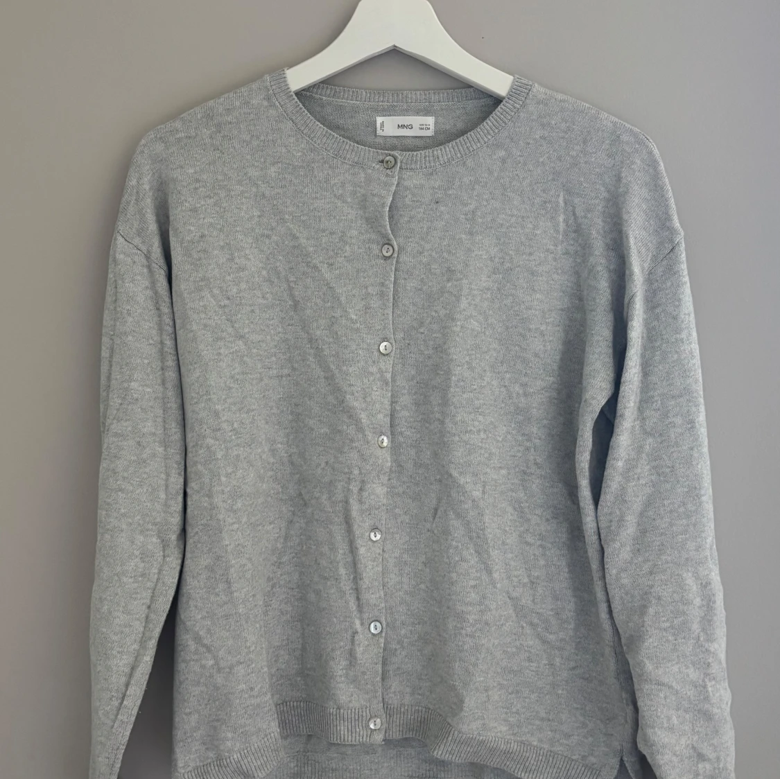 Grå kofta från Mango
