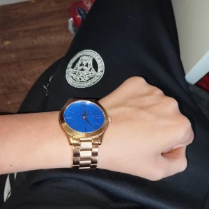 Michael Kors klocka - Guld blå Michael Kors klocka.
