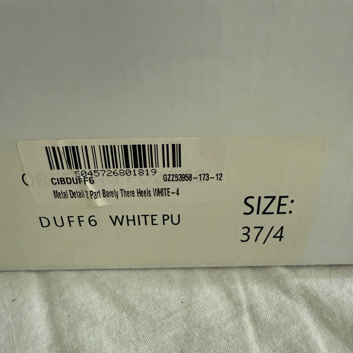 Vita klackar från Truffle Collection - 3