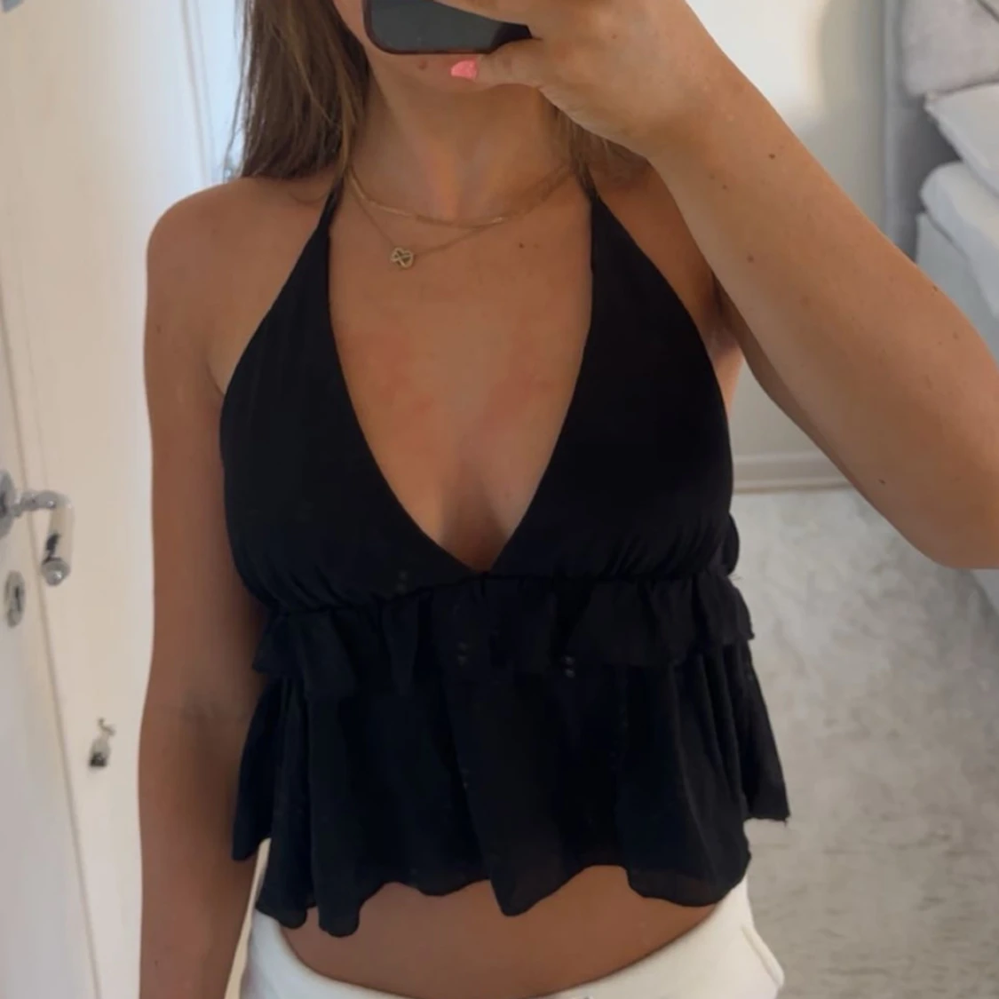 Svart volang topp