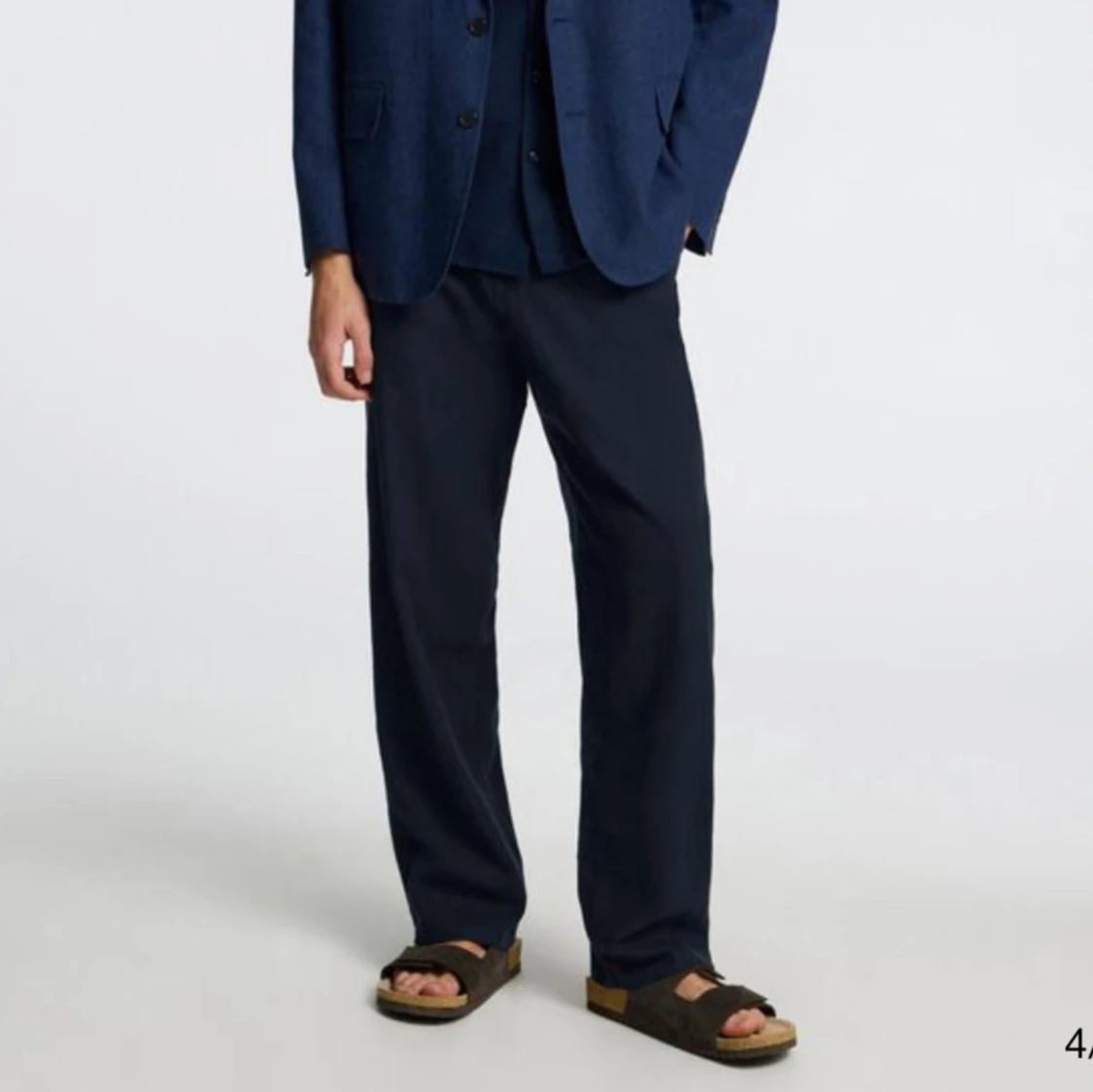 Marinblåa linnebyxor med snörning