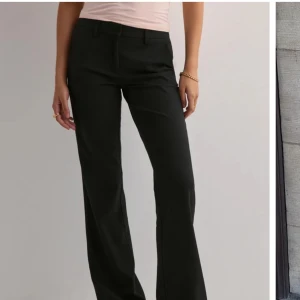Svarta kostymbyxor - Snygga svarta kostymbyxor från Nelly