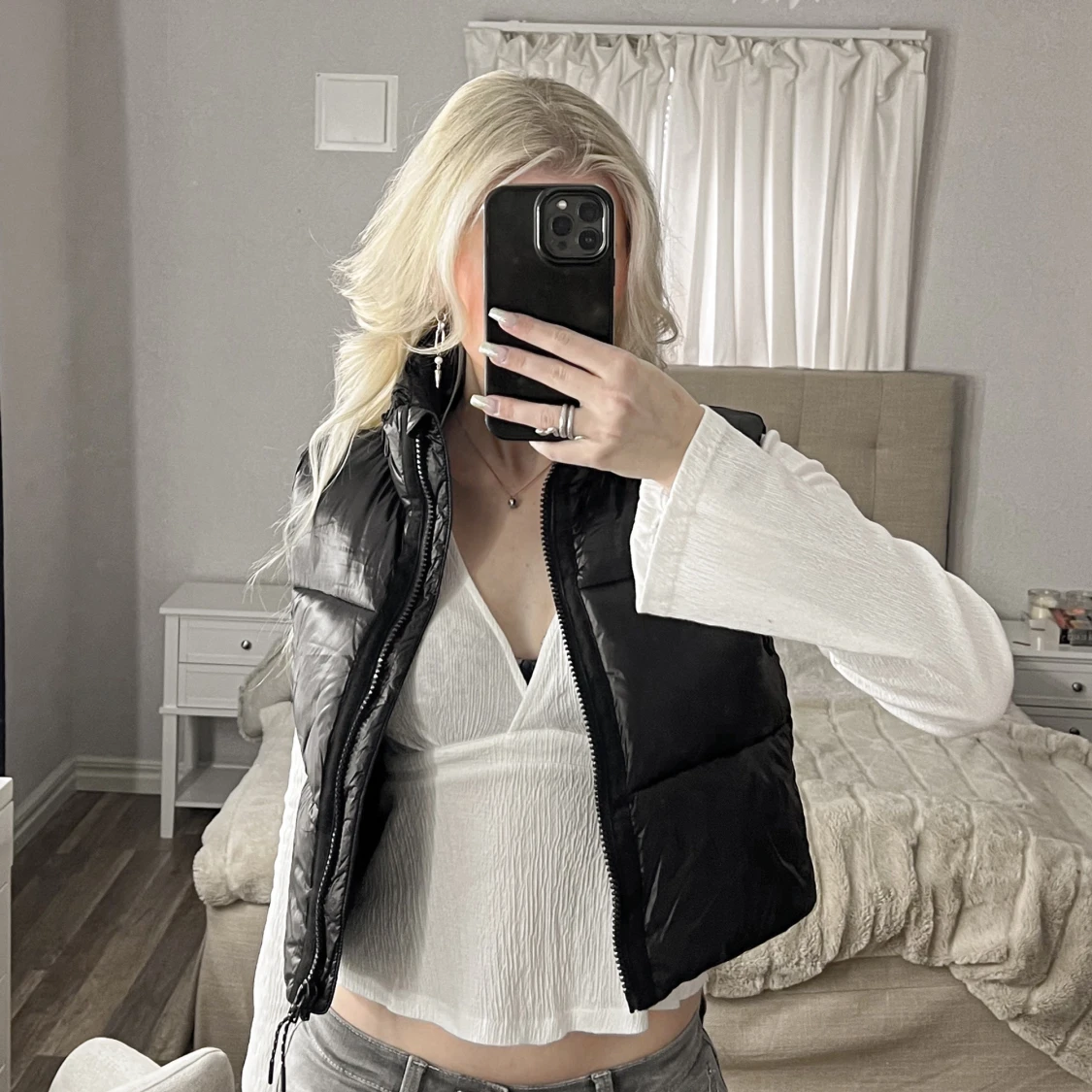 Svart dunväst från Zara