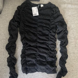 Glittrig topp - Aldrig använd. Mesh