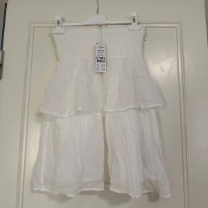 mini tupe dress Gina tricot - Jätte fin lätt mini tube dress från Gina, aldrig blivit använd pågrund av att jag har en annan i en större storlek som passar bättre