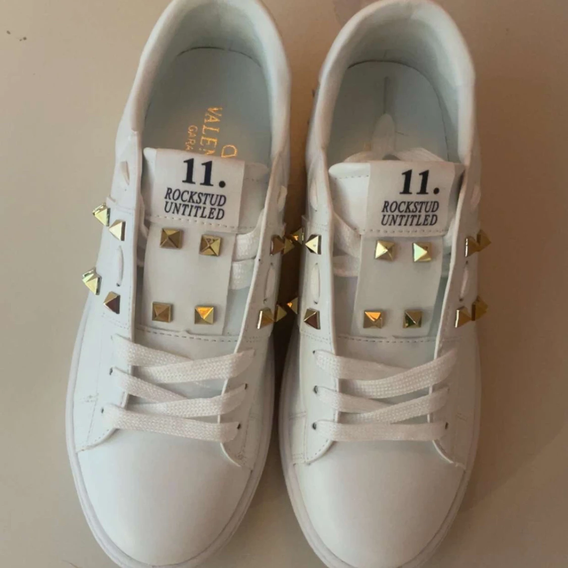 Valentino Rockstud Untitled sneakers vit