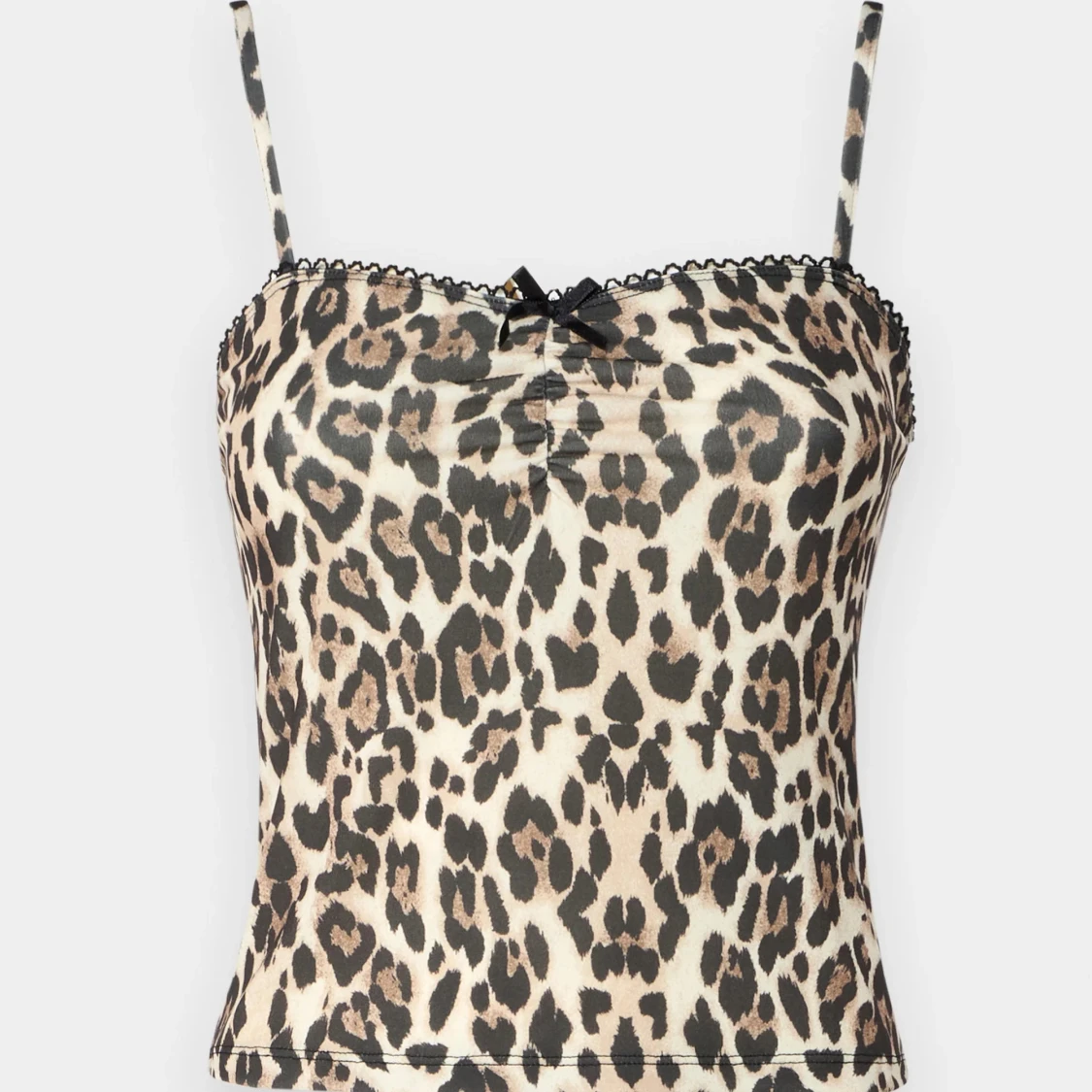 Leopardmönstrad linnetopp med rosett - 1