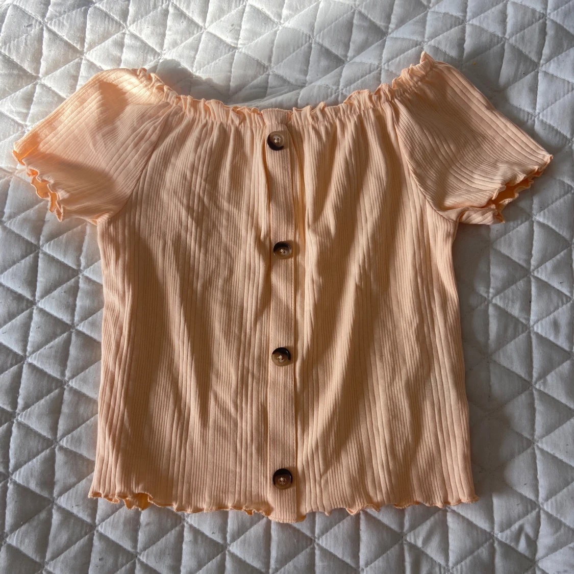 Persikofärgad topp från Kappahl