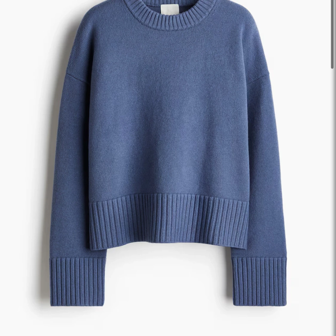 Blå stickad oversized tröja