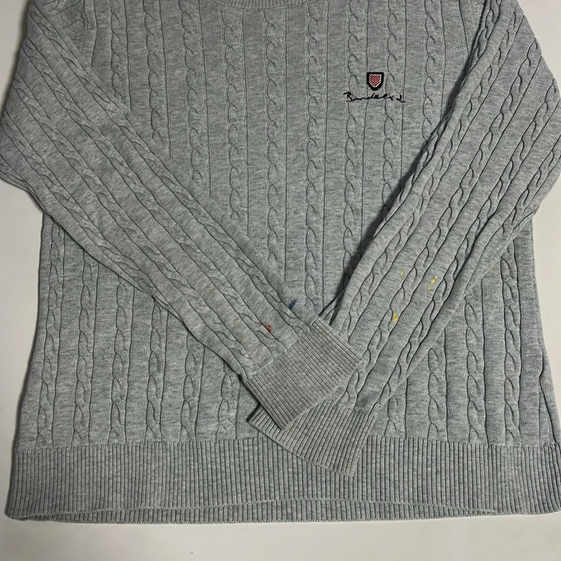 Grå kabelstickad tröja från Barbour