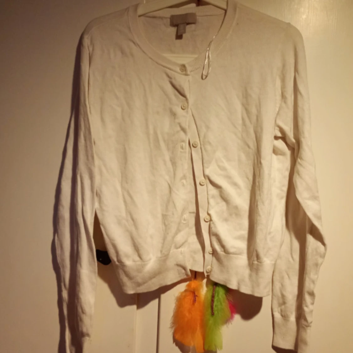 Vit kofta med knappar