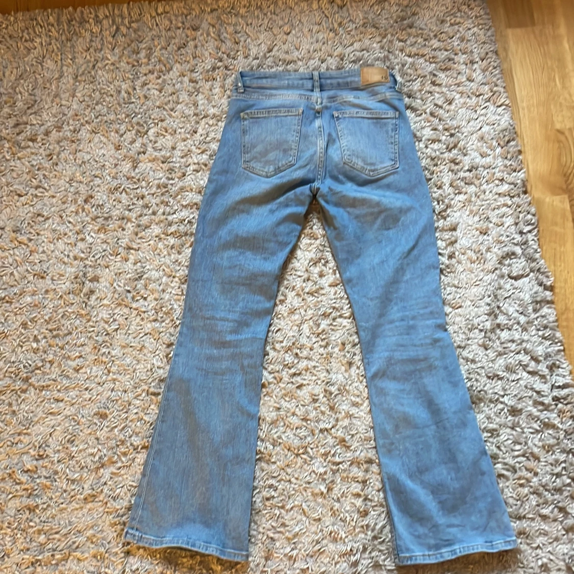 Ljusblå bootcut jeans från 157 - 1