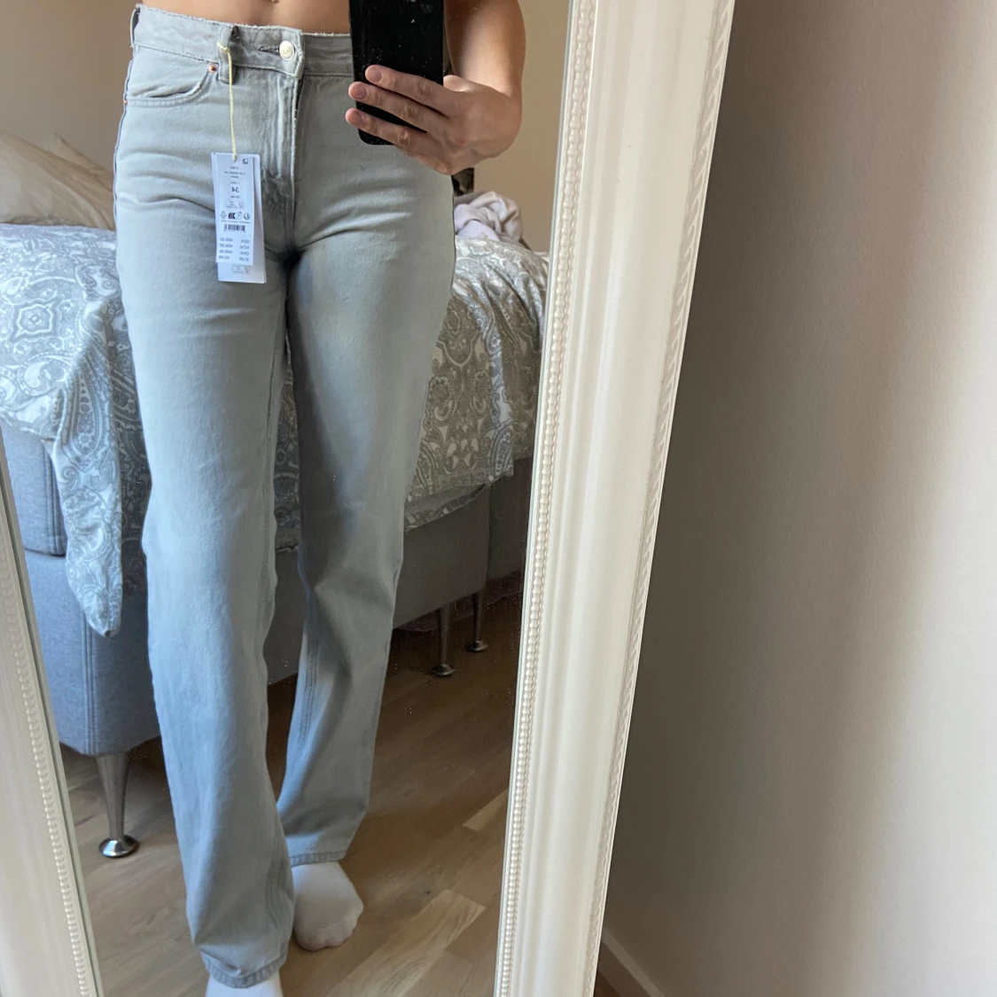 Ljusgråa straight jeans med låg midja