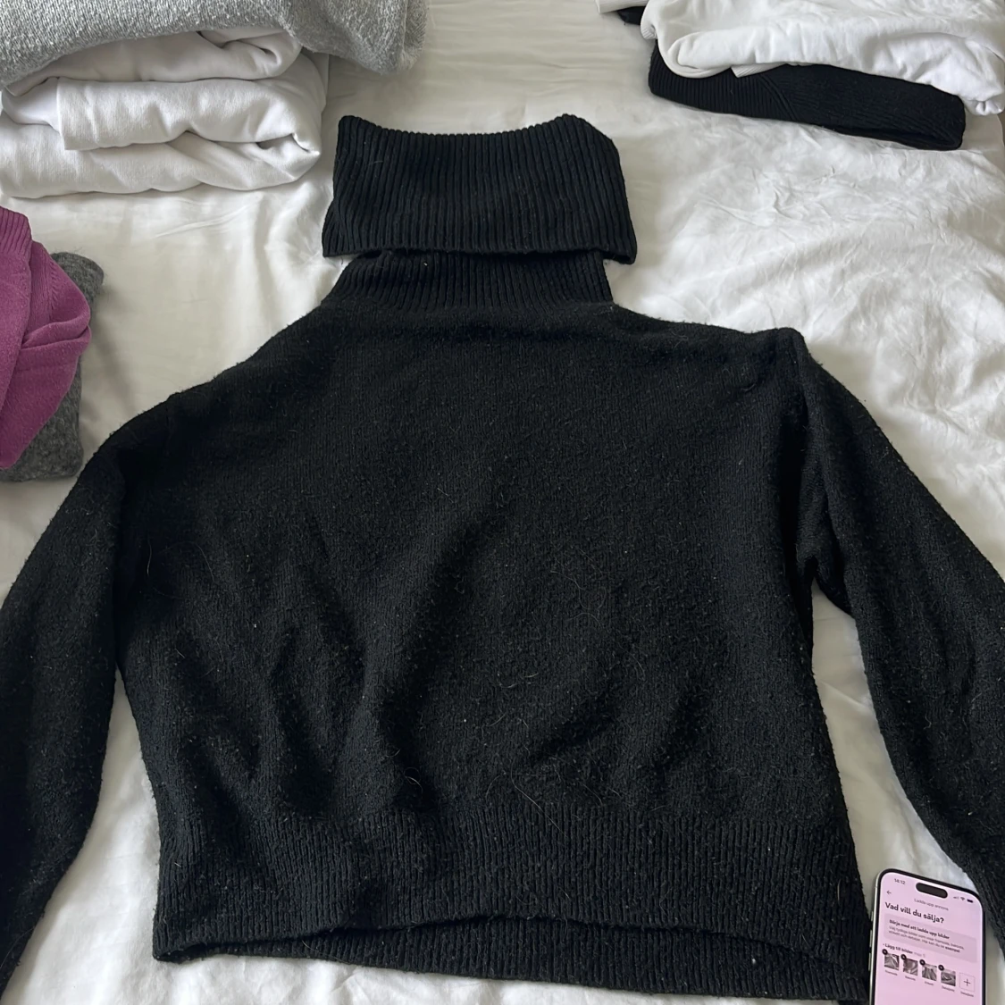 Svart polotröja från H&M XS