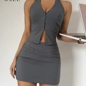 Grå ärmlös kortklänning med dragkedja - Säljer detta sättet, kjol och topp