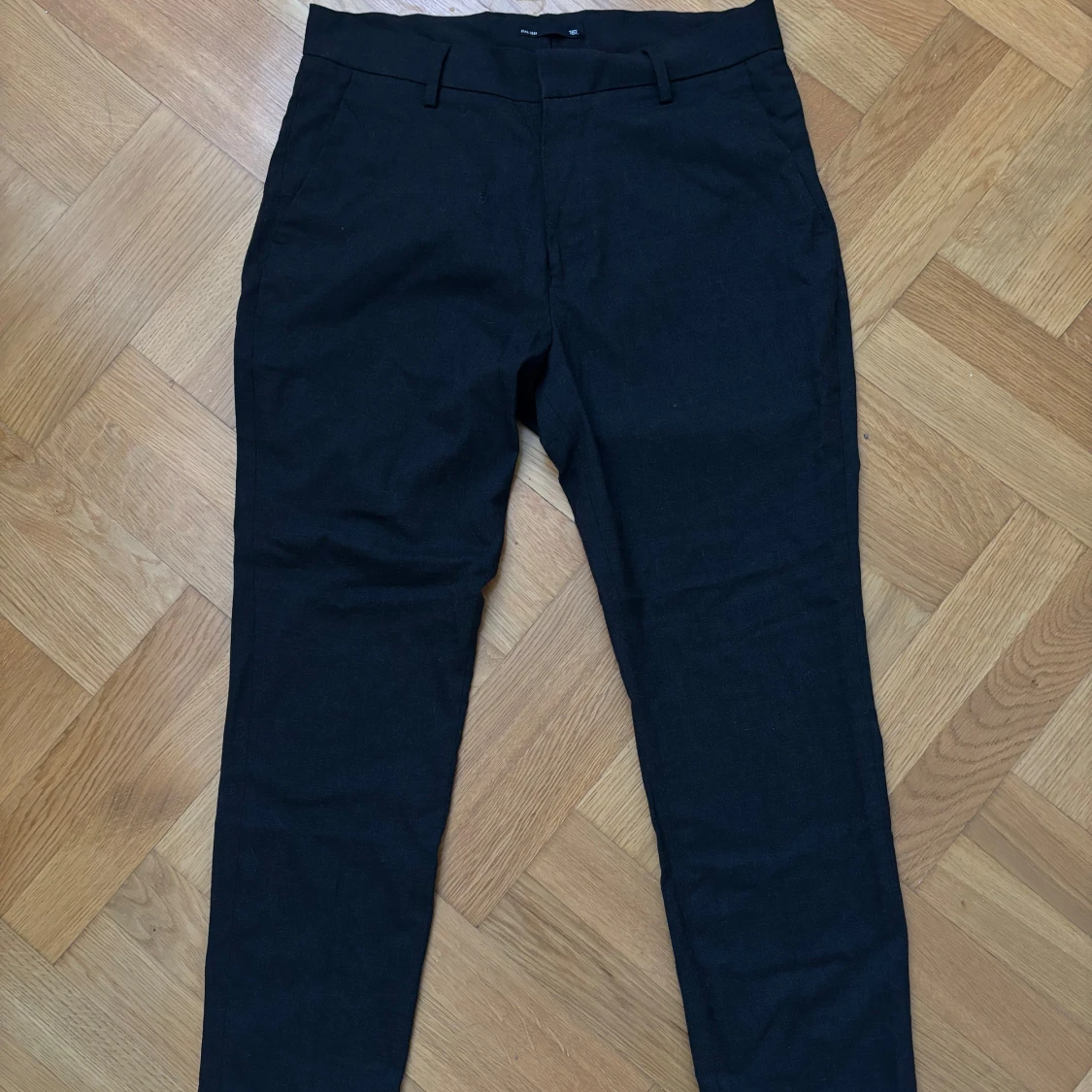 Svarta kostymbyxor med normal passform