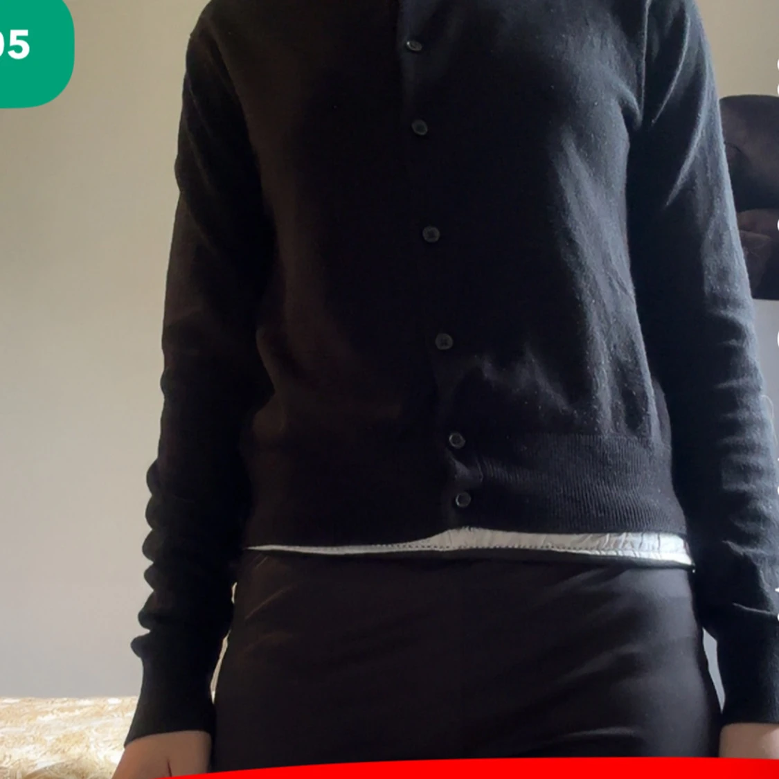 Svart kofta med knappar