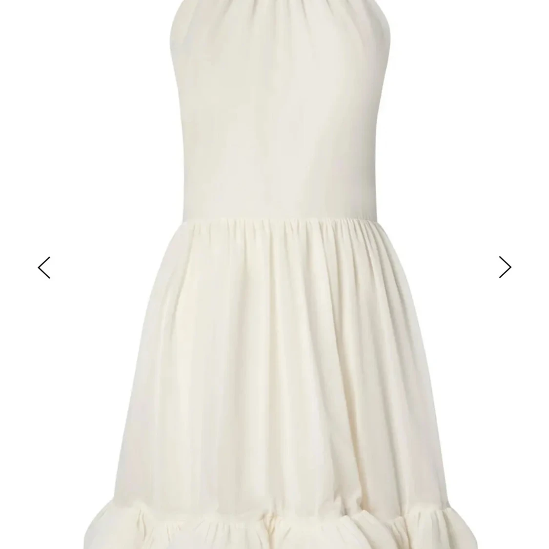 Vit miniklänning med halterneck och volang - 1