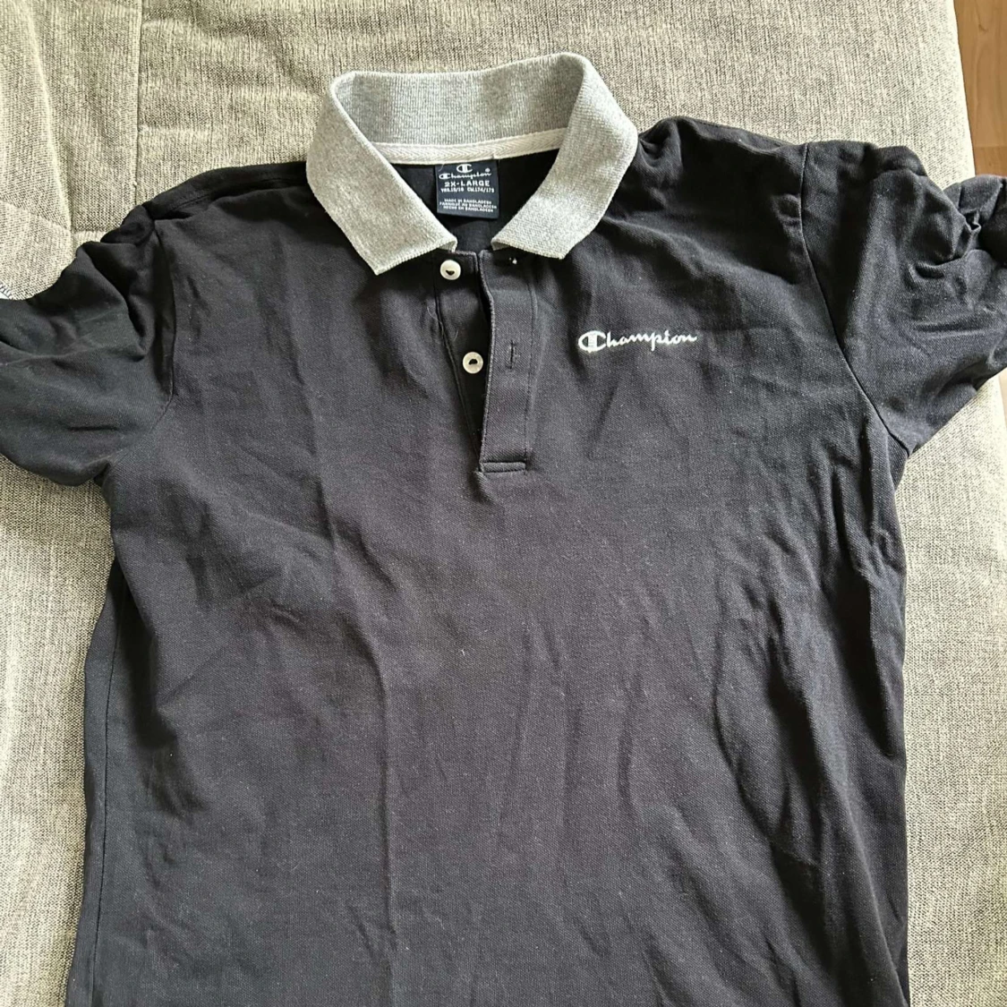 Svart pikétröja från Champion