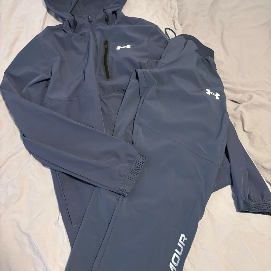 Blå tracksuit från Under Armour