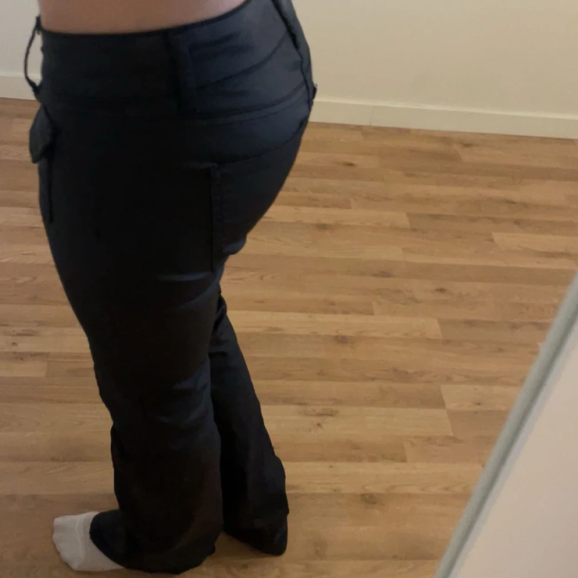 Svarta lågmidjade bootcut-byxor från Nelly - 2