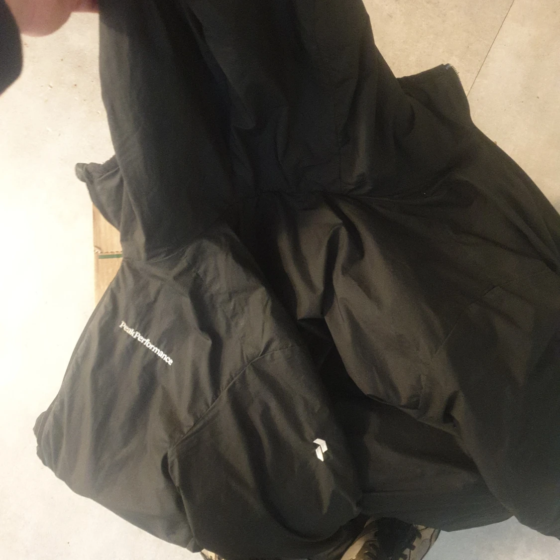 Svart dunjacka Peak Performance