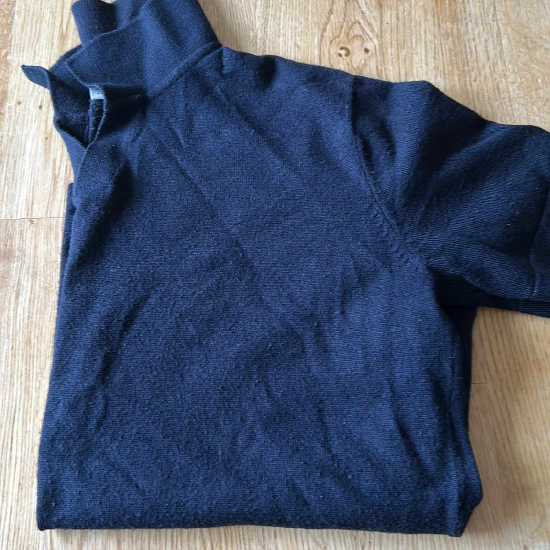 Mörkblå polotröja från Lindex