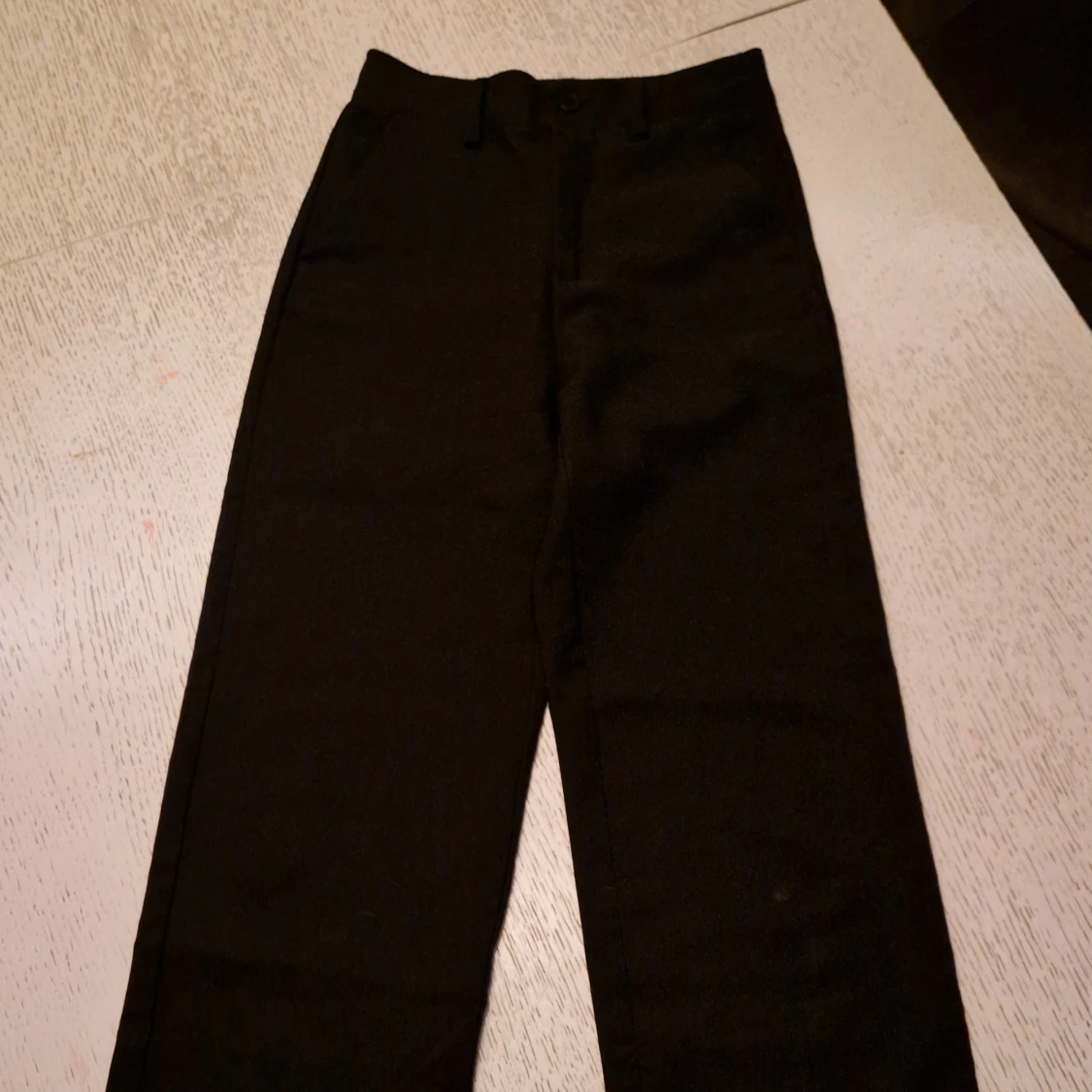Svarta kostymbyxor XOXO, strl 152