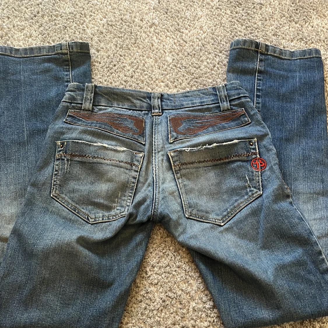 Low waist bootcut jeans med vingar bak - 1