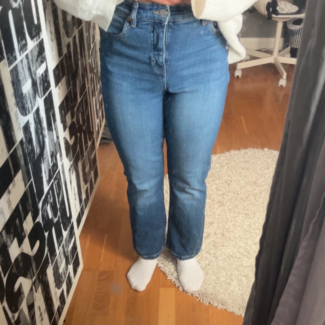 Högmidjade blå jeans storlek 40