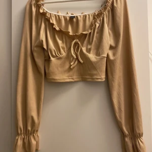Beige blus  - Endast prövad 