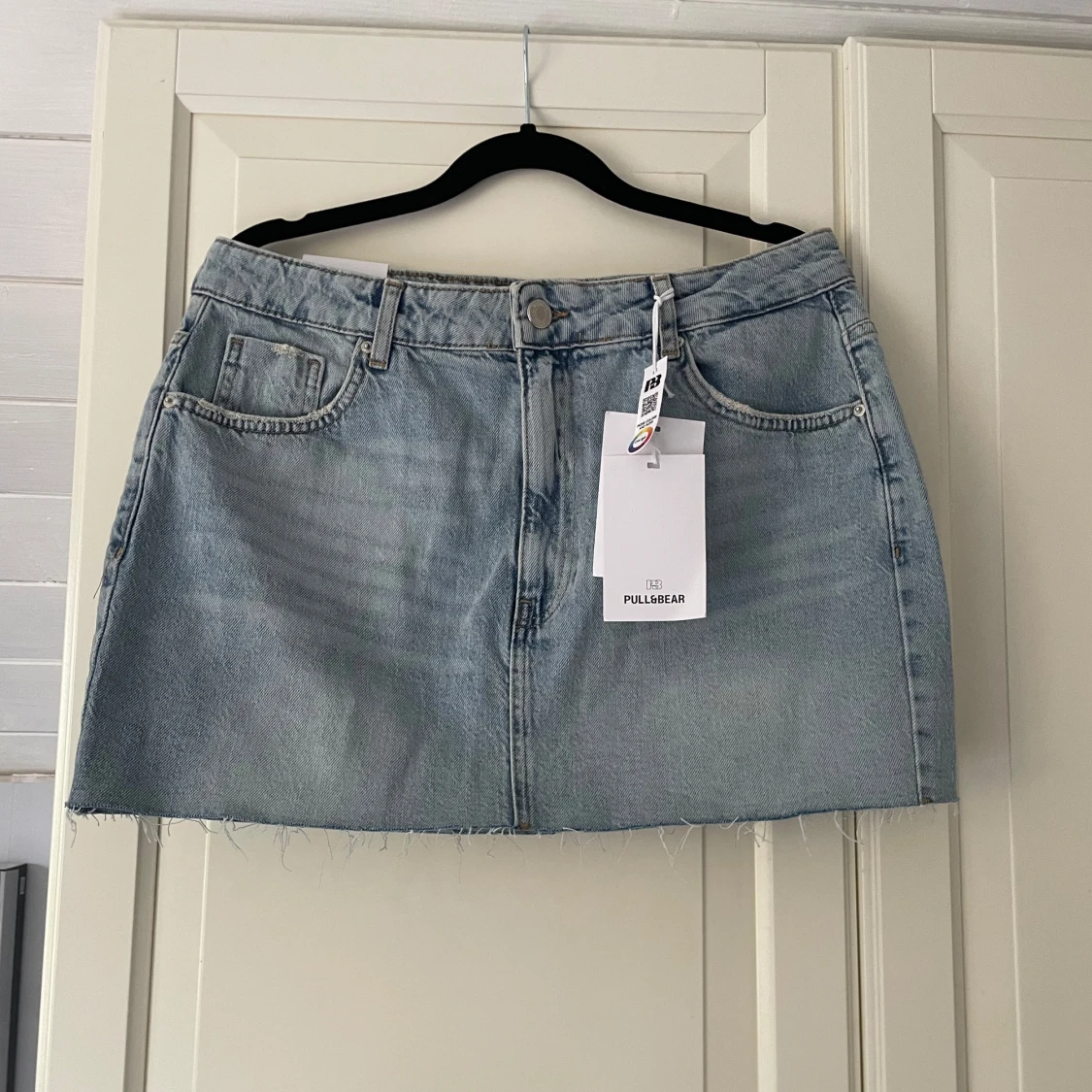 Ljusblå jeanskjol från Pull&Bear XL