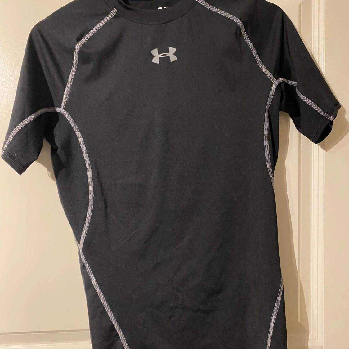 Svart kompressionströja från Under Armour