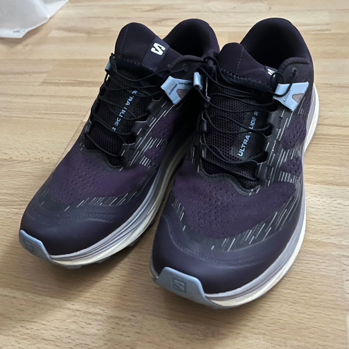 Svarta och lila löparskor från Salomon - 1
