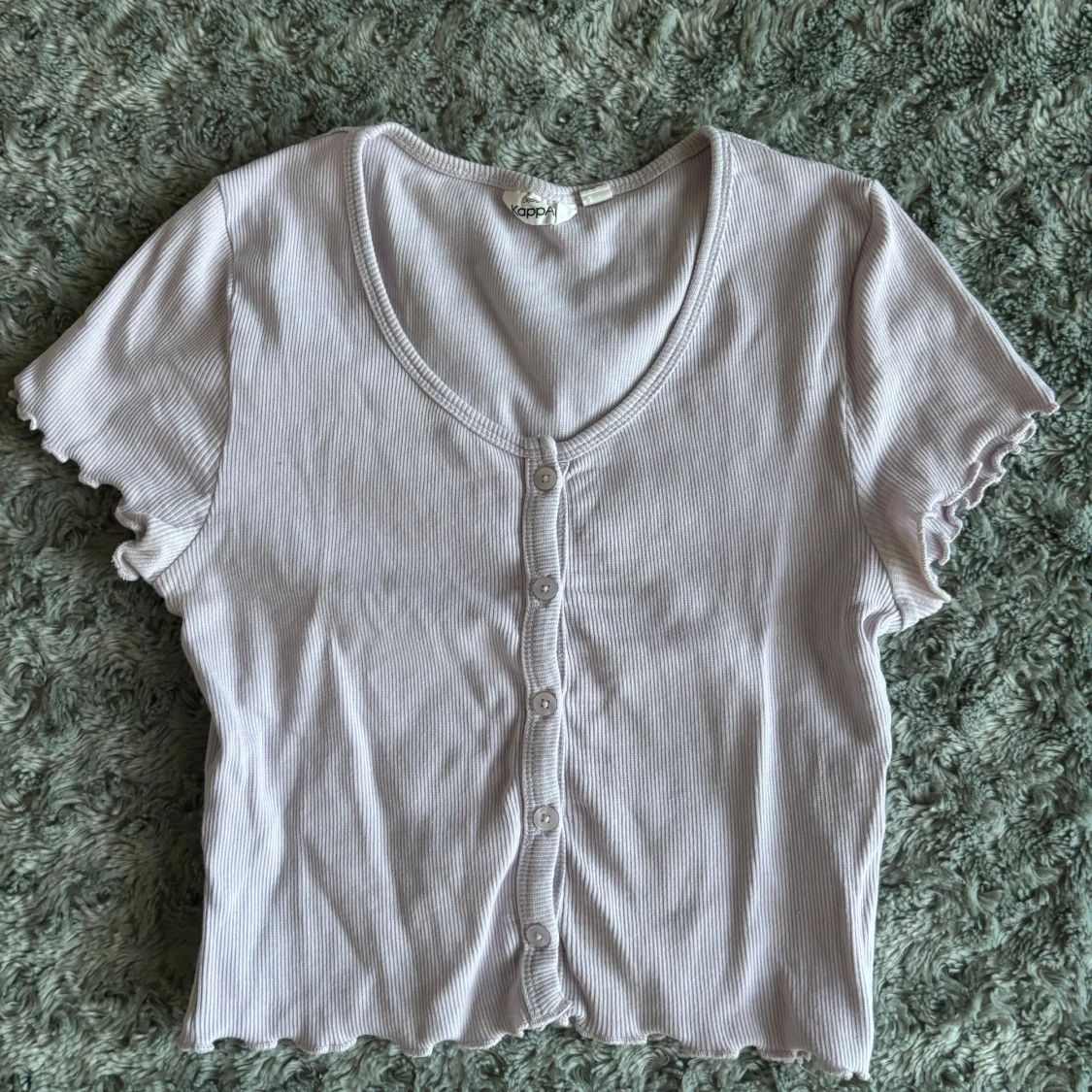 Ljuslila ribbad topp från KappAhl