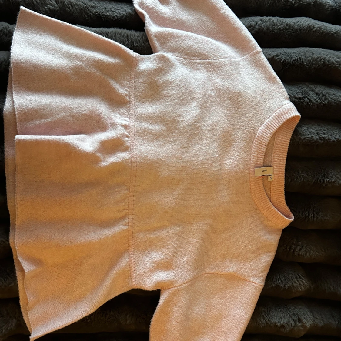 Ljusrosa stickad tröja från Nelly