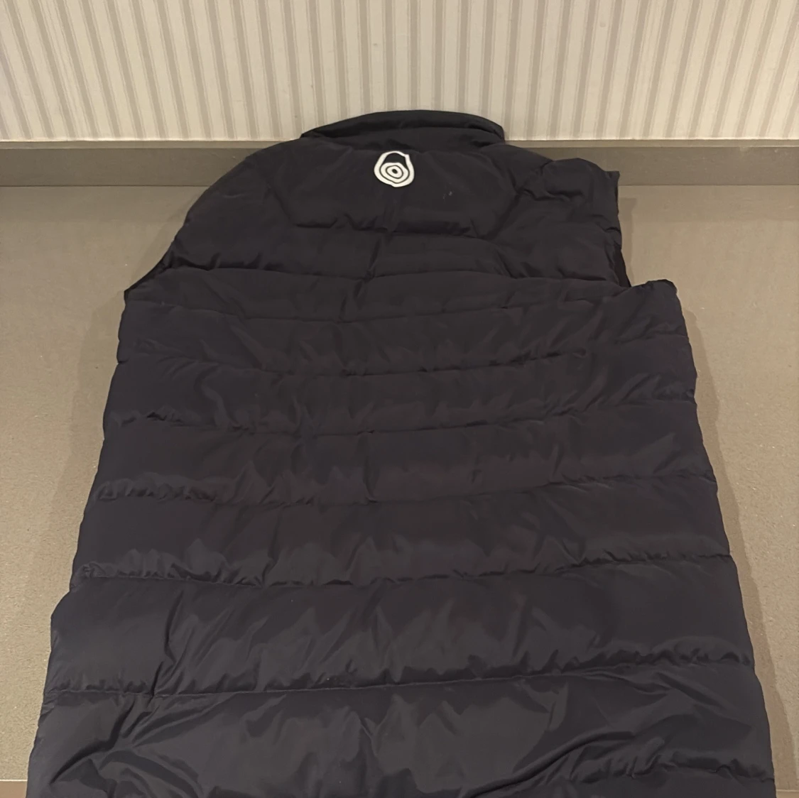 Svart dunväst från Sail Racing - 2