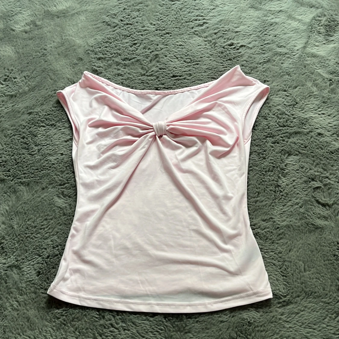 Ljusrosa topp med rosett från SHEIN