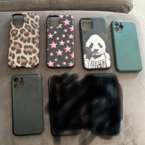5 coola mobilskal i olika mönster - Säljer sju olika mobilskal till iPhone, bland annat ett leopardmönstrat, ett med rosa stjärnor, ett med panda-tryck och flera enfärgade i svart och grönt. Perfekt för dig som vill byta stil på mobilen ofta!