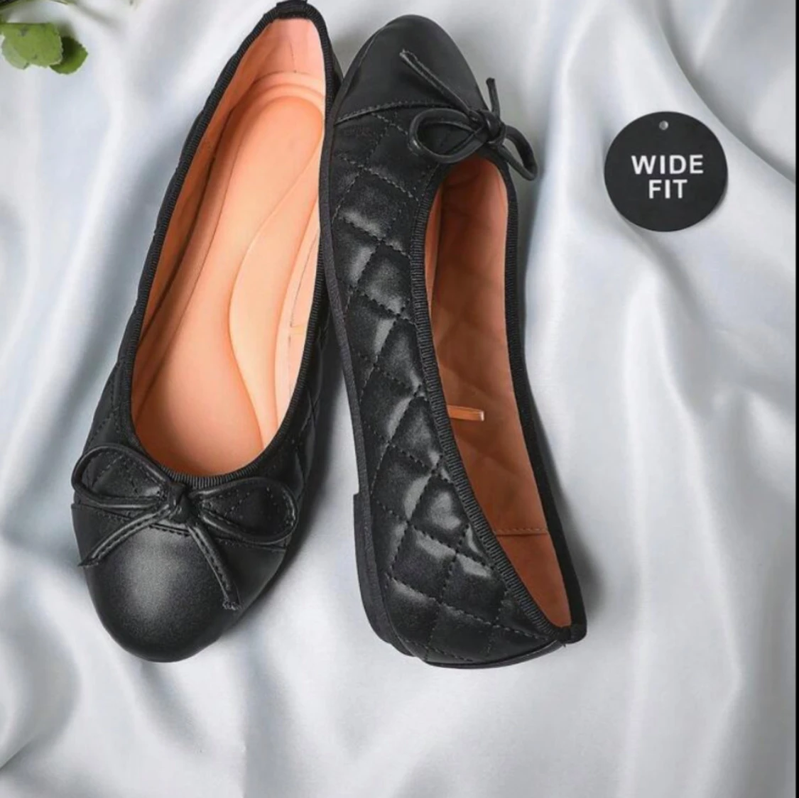 Svarta ballerinaskor med rosett